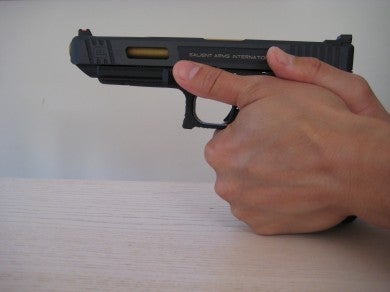 Support hand is more toward the rear of the pistol.