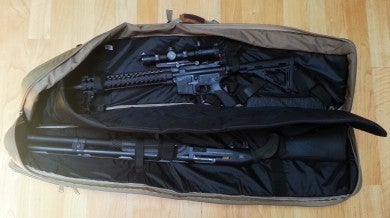 Two long guns fit in the main compartment. 