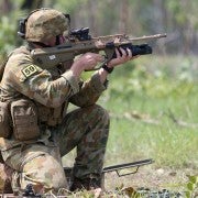 Private Jackson Bartlett from the 5th Battalion Royal Australian Regiment pulls the newly position trigger on the new Grenade Launcher Attachment (GLA) on an EF88 Austeyr weapon at Kangaroo Flats firing range, outside of Darwin.