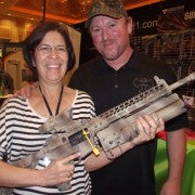 Cindy Dietz and Jeff Axelson with the Danny Dietz Tribute Rifle