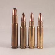 Three 6.8 SPC cartridges and their parent round. Left to right: .30 Remington, 6.8 SPC 115gr Sierra BTHP, 110gr Hornady OTM, XM68GD 90gr soft point.