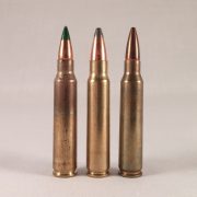 The .25-45 Sharps flanked by the 5.56mm M855 and Mk. 262 rounds.