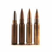 On the right are two types of 7.62 NATO round, the M80 and M80A1, alongside two of its predecessors. Center left is the .30 T104 ball cartridge using the 1948 T1E1 case. Left is the .300 Savage, which was the starting point for what became the 7.62 NATO.