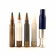 So far, the polymer composite case has only found purchase with low-power specialty ammunition, such as the plastic blank and fired 7.62mm UTM marking round, both on the left. Several commercial composite cased rounds have been tried, including the grey .223 Remington PCA ammunition. In the 1970s, Frankford Arsenal and AAI experimented with composite cased ammunition, represented by the white cased round in the middle. On the left is a standard Korean-made M855 round.