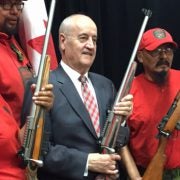 Associate-Minister-of-Defence-Julian-Fantino-centre-poses-with-members-of-the-Canadian-Rangers-at-the-Colt-Canada-plant-in-Kitchener.-Albert-Delitala
