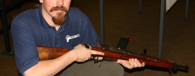 Author with a Cei-Rigotti rifle, courtesy UK MoD