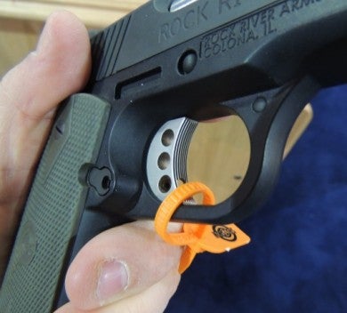 A closer look at the machined speed trigger on the 1911 Poly.