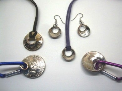 Coins shot by Tia and turned into jewelry. All proceeds go to help Tia train for competition. 