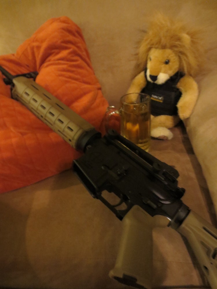 After a long day of being tactical, there is nothing quite like settling down to clean weapons over a cold brew. 