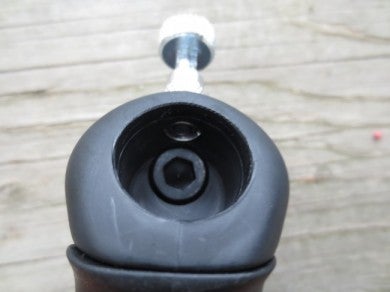 A view of the retention knob  pin. Its a modification to a Tamer grip that extends only about 3/16" into the stock itself. 