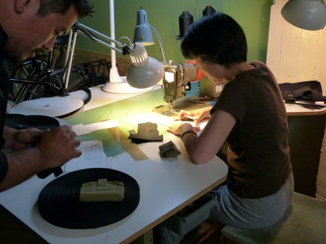 A seamstress works alongside Dan to build prototypes and try out new designs. 
