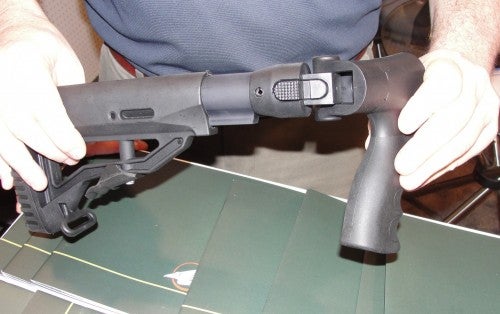 The Derya collapsible stock is released by two button levers at the joint.