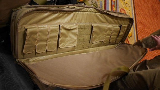 The brand new Hazard4 double rifle case with loop-style liner on the other rifle compartment of the case, with interior MOLLE and mag pouches.