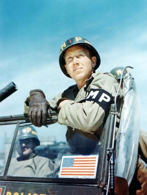 Private Clyde Peacock, 1st Military Police (MP) Platoon of the 1st Infantry Division of the United States Army in June 1944 in Dorset, United Kingdom. The 1st Division was one of the two divisions that stormed Omaha Beach on D-Day suffering high casualties. (Photo by Galerie Bilderwelt/Getty Images)