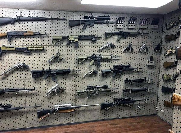 creative-gun-display-shelving-in-room