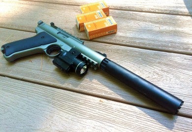 A Ruger MKII with a Pac-Lite threaded barrel and a SilencerCo Warlock. Gemtech makes suppressor-specific ammunition.