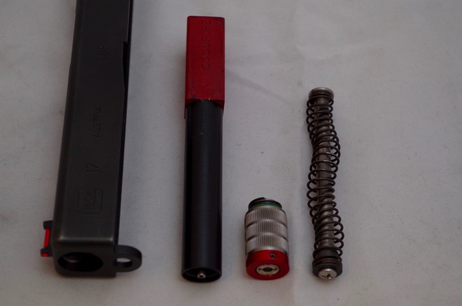 CoolFire components, basically a barrel replacement with spring, and a laser.