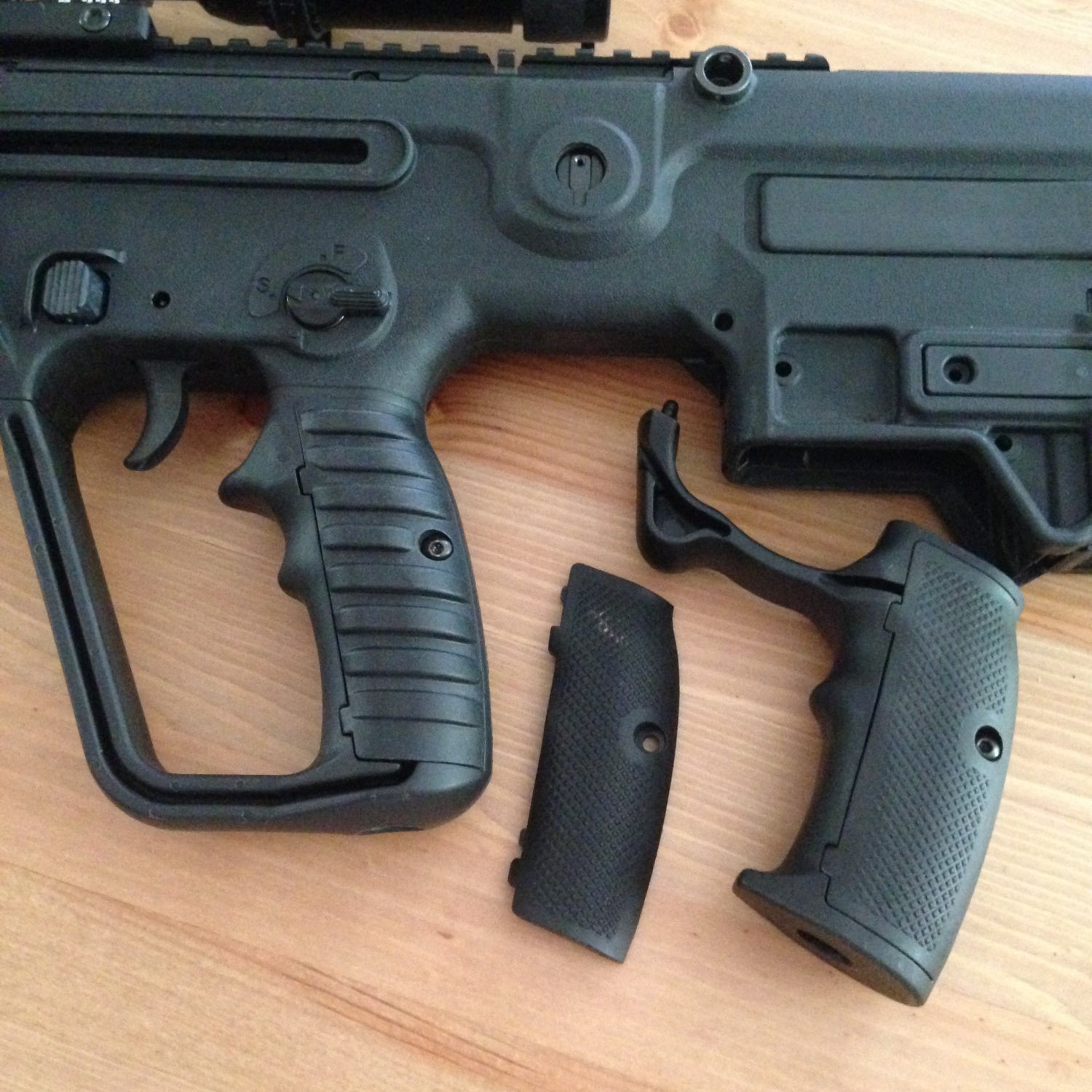 Like the Tavor SAR, the X95 has a cutlass style hand guard that acts as a g...