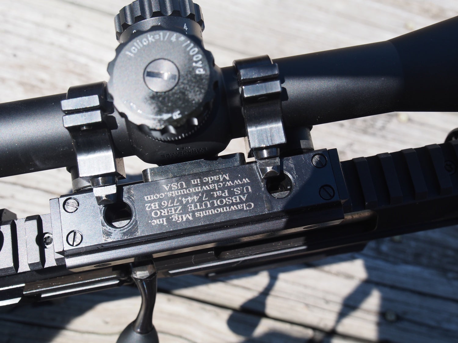 Note the "claws on the scope ring base and corresponding" Claws" inside the upper mount base.