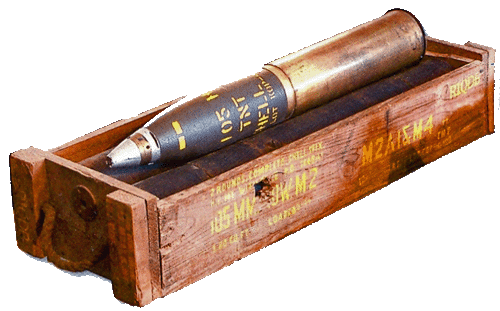 A 105mm Howitzer round in the original shipping crate. The type of round is stamped on the upper portion in yellow letters.