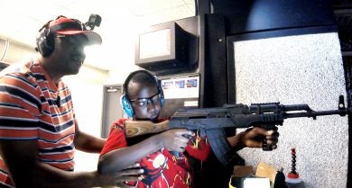 Igoche shoots AK47