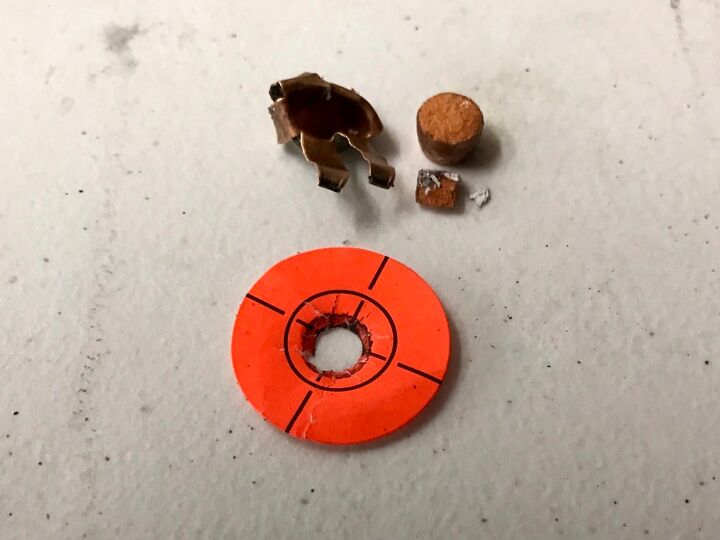 You can see the jacket expanded (after entering the bullet trap, and that compressed material slug was still mostlly inctact. We also recoved that once in a lifetime focus dot (which you can see fly off in the slo-mo video).