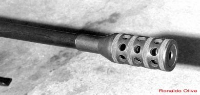 The characteristic barrel attachment which doubled as a flash hider and muzzle brake.