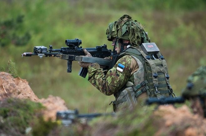 Estonian_soldier_laying_down_suppressive