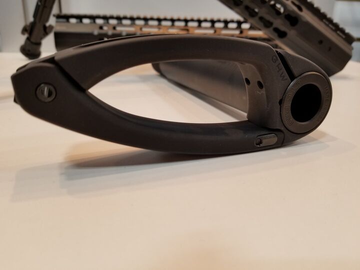 The pistol brace has a locking pin at it's base to prevent it from rotating on the tube. 