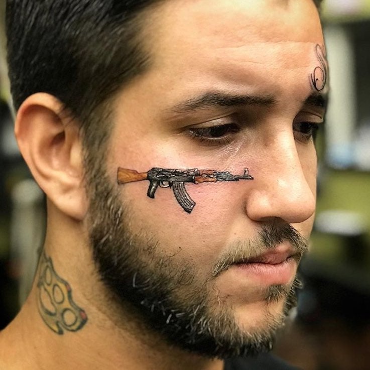POTD: AK-47 Face Tattoo -The Firearm Blog