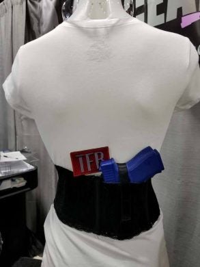 Miss Concealed holsters, designed to wear at the shooter's draw position.