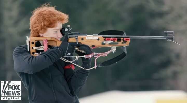 Shooter shooting a biathlon rifle