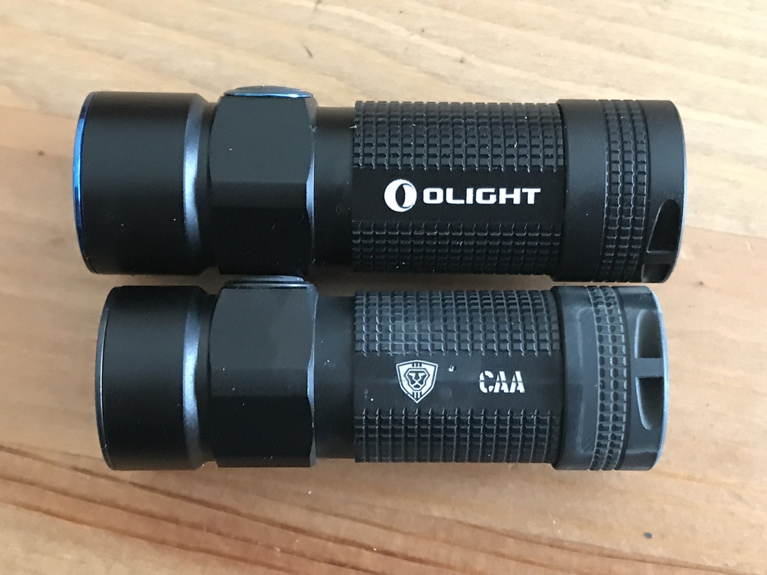Olight S1R above and CAA S1 below
