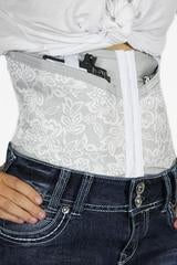 The concealed carry corsets from Dene Adams allow the wearer to holster their weapon in a sub-layer of the compression pulling their gun to the body. 