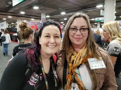 Rachel at SHOT Show 2018 with Barbara Baird of Women's Outdoor News and Project ChildSafe.
