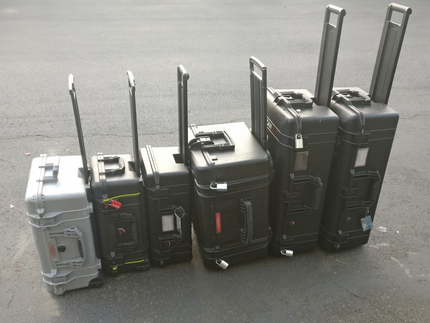 The Explorer Case model 5833 is positioned as a strong contender to compete with a variety of other products on the market.  It is seen here in the very middle of a line of various Pelican Protector, Pelican Storm, and Pelican Air cases owned by the author and his team.
