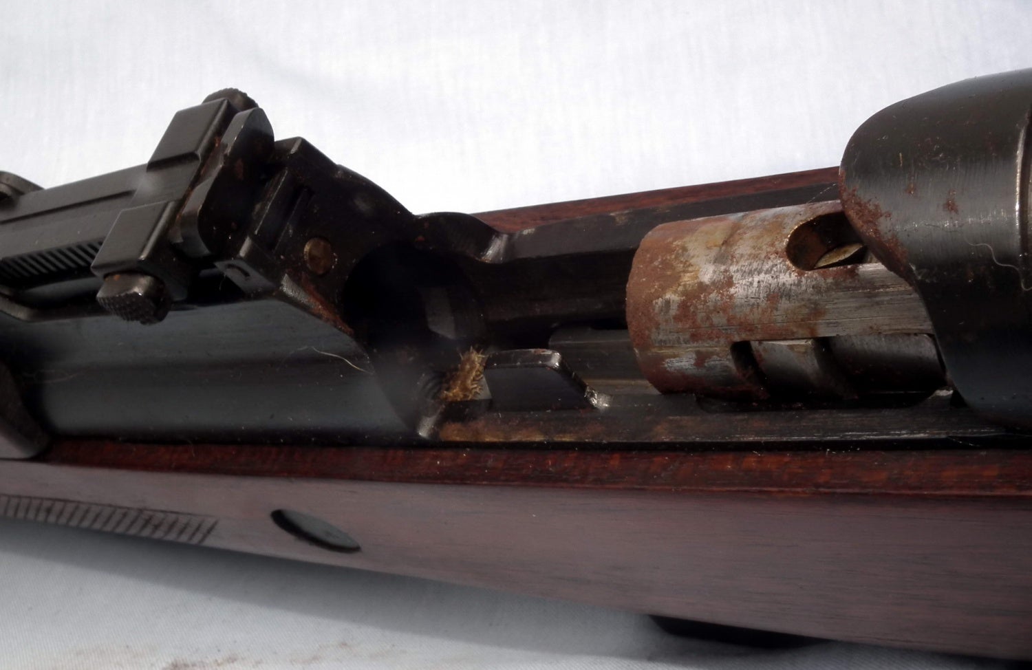 This open chamber view clearly shows the left breech locking lug on the side of the (somewhat rusted) bolt.