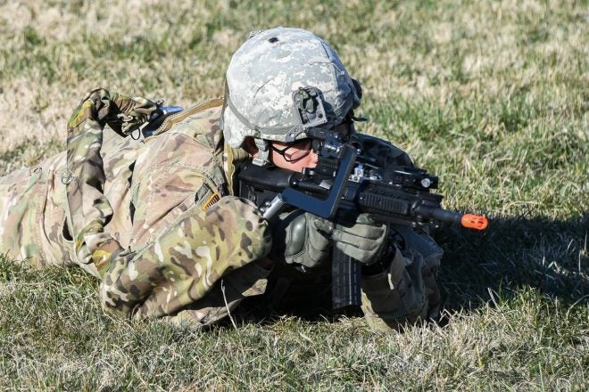 Soldier in prone with Third Arm