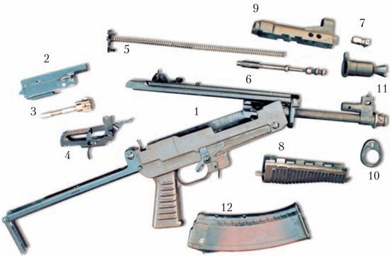 Field strip of original Dragunov MA prototype:1 - upper and lower receiver with barrel and folding stock, 2- bolt carrier, 3- bolt, 4 - trigger mechanism, 5 - recoil spring assembly, 6 – piston, 7 - gas block plug, 8 lower handguard, 9 upper handguard, 10 lower handguard retainer, 11 flashider, 12 magazine.