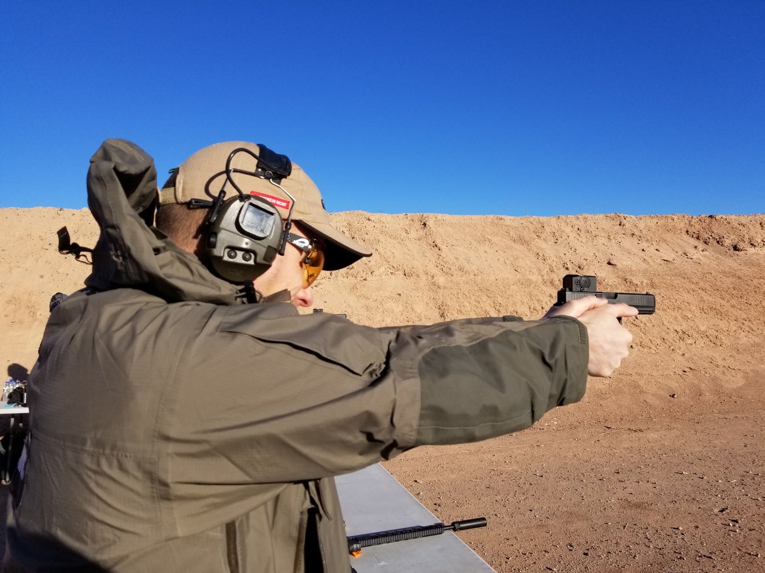 Aimpoint representative shooting a Glock 17 gen 5 with ACRO P-1 red dot sight.