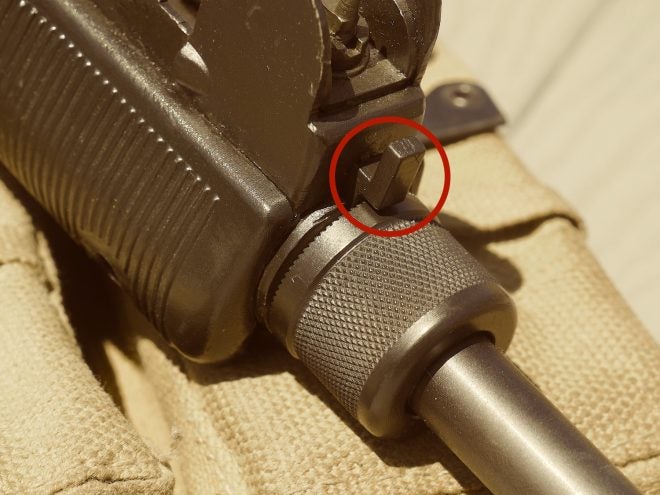 Barrel nut retaining catch circled in red