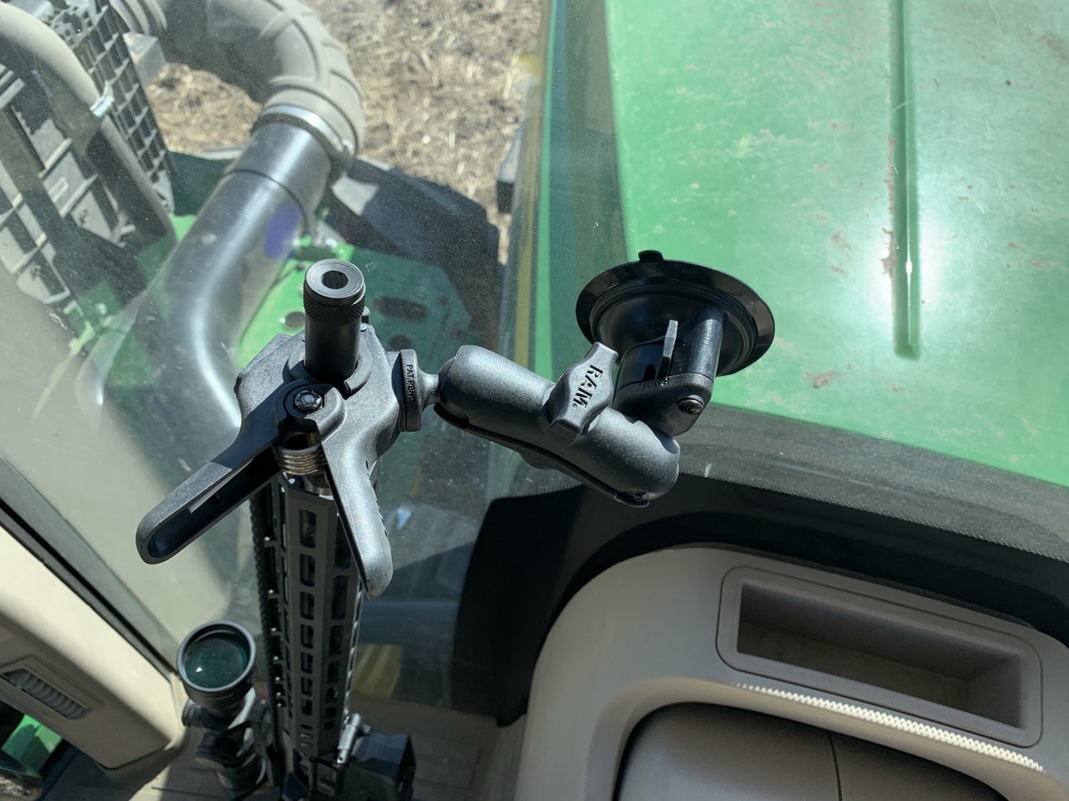 POTD: Mounting a rifle in a tractor
