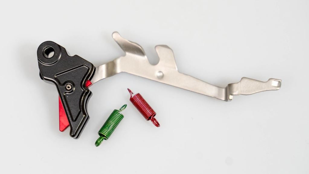 The Walther TAC Trigger kit, shown here with both of the alternate spring options for two choices of lighter pull.