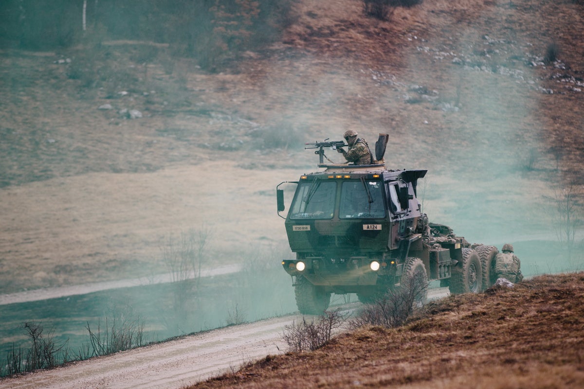 POTD: Rain, Dirt, Gas - U.S. Army Paratroopers in Slovenia