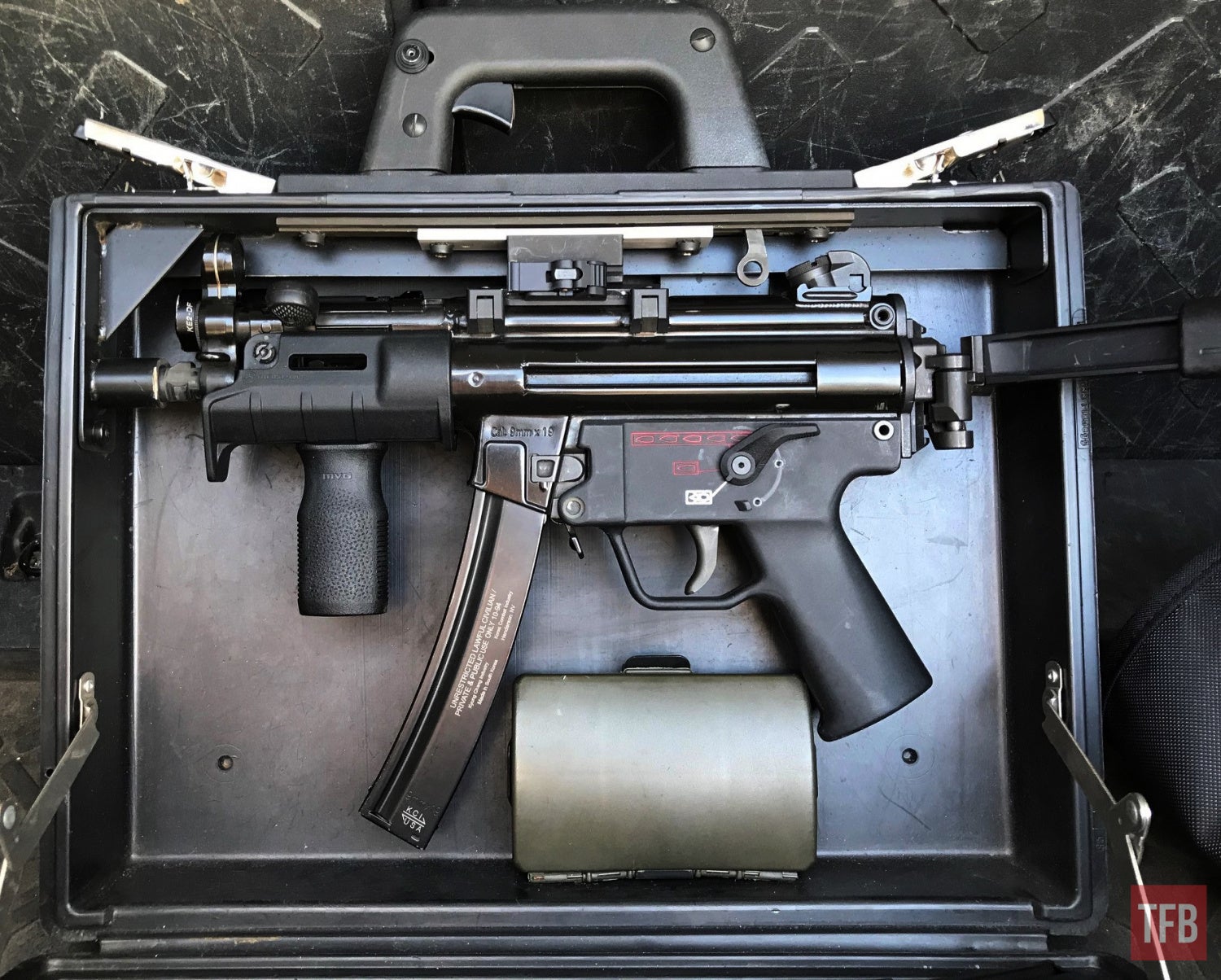 At the bottom of the Magpul MP5K SL handguard, are one and a half M-LOK slo...