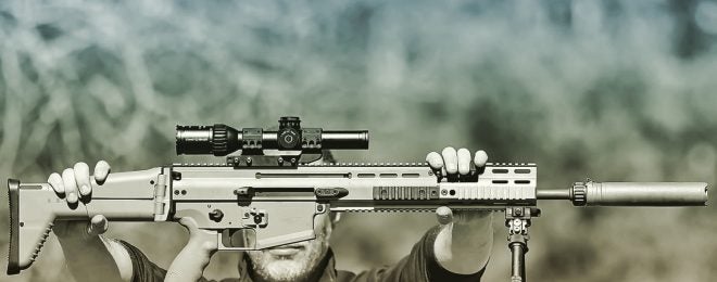 Suppressed FN SCAR 17 with Handl Defense Lower
