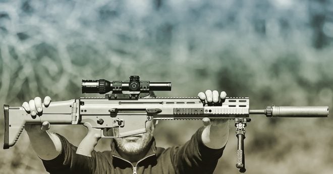 Suppressed FN SCAR 17 with Handl Defense Lower