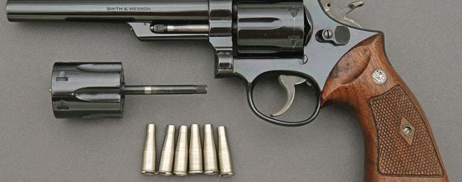 The S&W 53, complete with interchangeable .22lr cylinder. Image Source: Amoskeag Auction Company