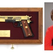 Don't adjust your TV sets, kids: there really is a Conway Twitty Tribute Pistol, as seen here in its optional display case.