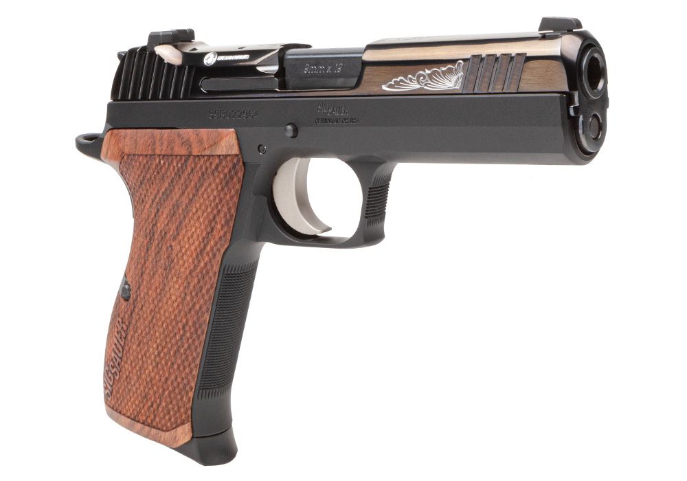 The P210 Carry Custom Works features a polish slide with engraved scrollwork.